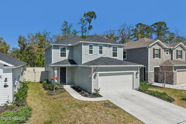 front view of a house with a yard