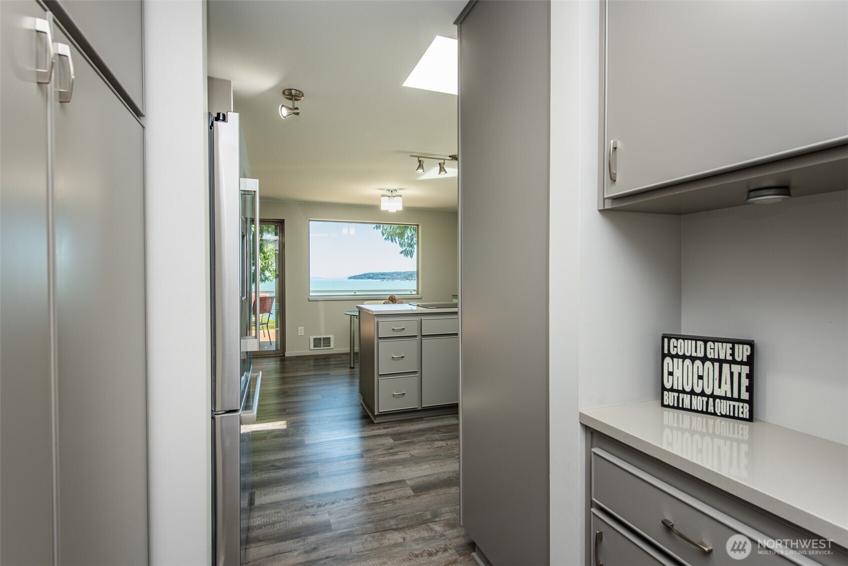 681 Bachelor Road Sequim, WA 98382 - Photo 18 of 39 a view of a kitchen from the hallway