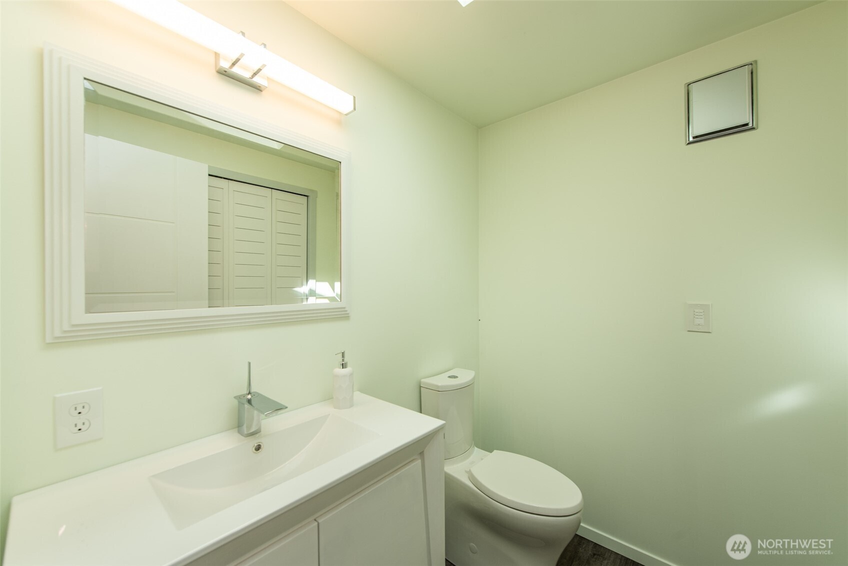 681 Bachelor Road Sequim, WA 98382 - Photo 19 of 39 a bathroom with a sink a toilet and a mirror