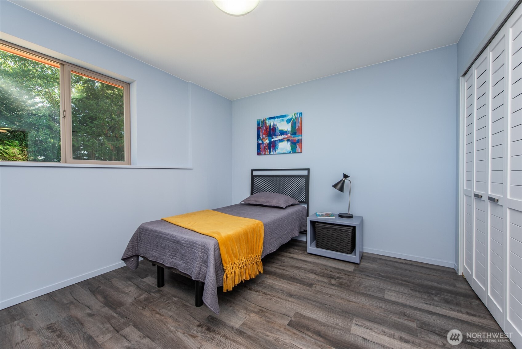681 Bachelor Road Sequim, WA 98382 - Photo 22 of 39 a bedroom with a bed table and a window