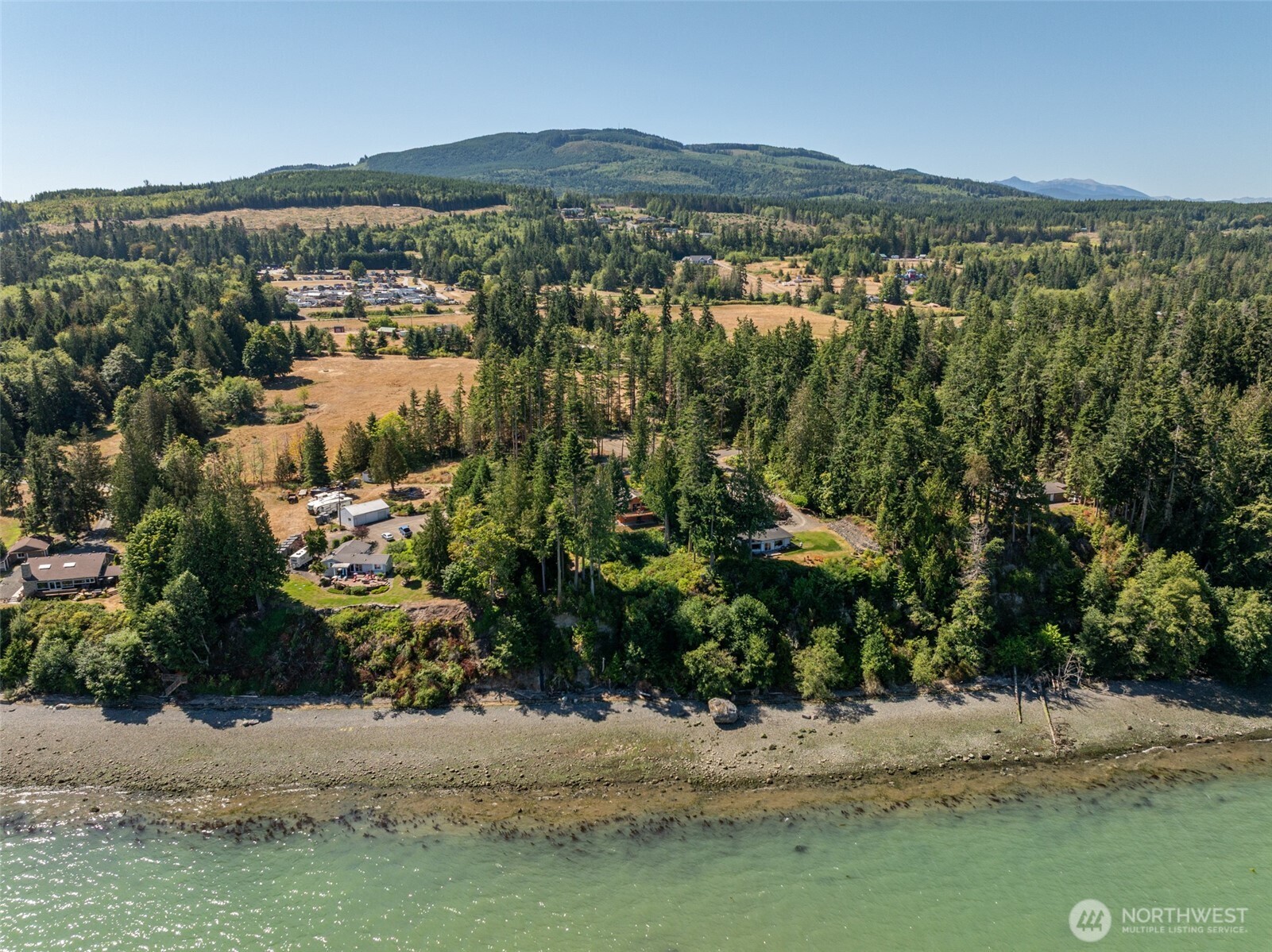 681 Bachelor Road Sequim, WA 98382 - Photo 30 of 39 a view of a lake with houses