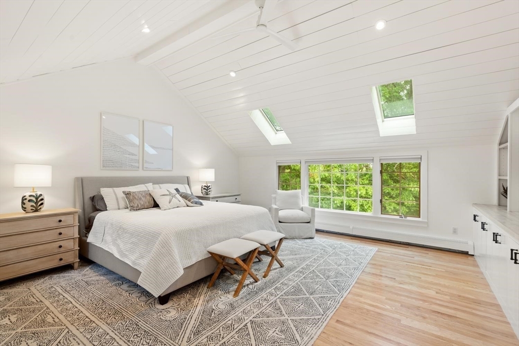 105 Thornberry Road Winchester, MA 01890 - Photo 16 of 35 a bedroom with a large bed and a window