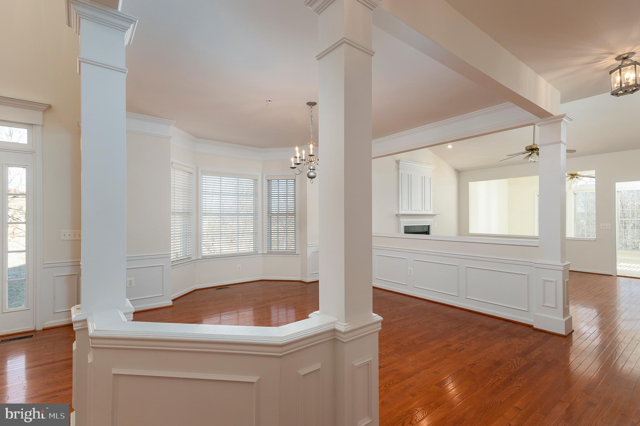 8248 Academy Road, Unit 10 Ellicott City, MD 21043 - Photo 11 of 53 Dining/Living Room to Sunroom