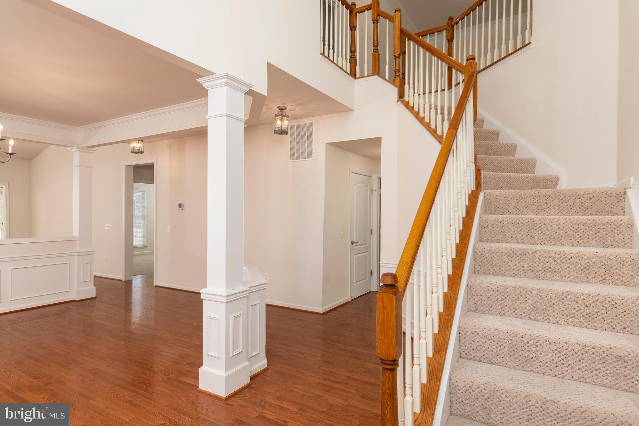 8248 Academy Road, Unit 10 Ellicott City, MD 21043 - Photo 5 of 53 Foyer to Living Room