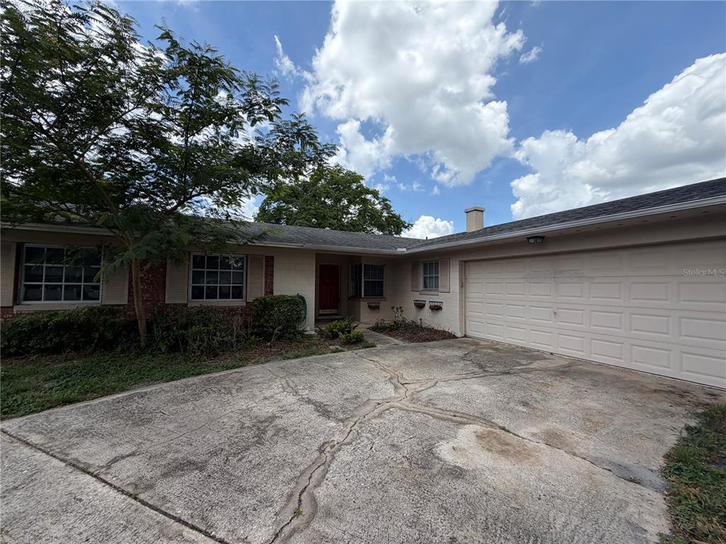 517 London Road Winter Park, FL 32792 - Photo 2 of 13 a view of a house with a outdoor space