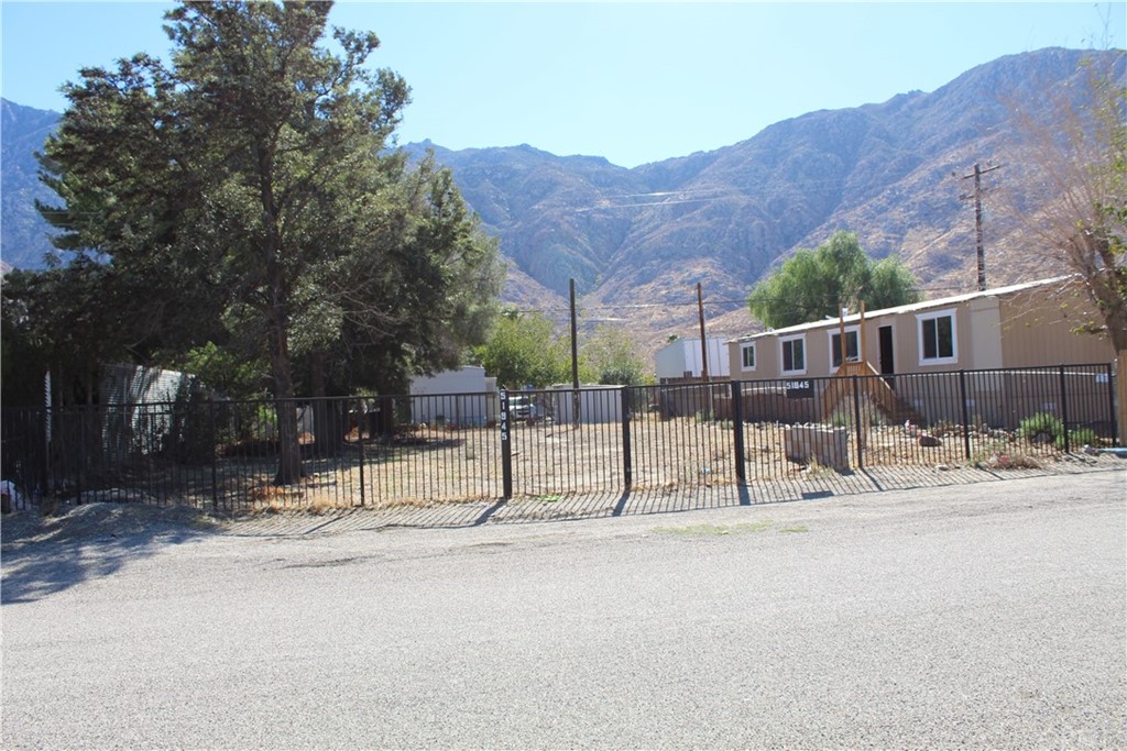 51945 Maxine Avenue Cabazon, CA 92230 - Photo 2 of 21 a view of house with outdoor space and backyard