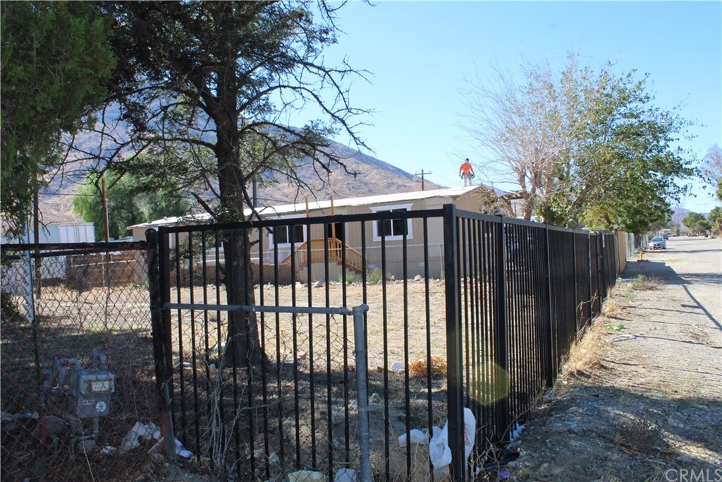 51945 Maxine Avenue Cabazon, CA 92230 - Photo 12 of 21 a view of a wrought iron fences