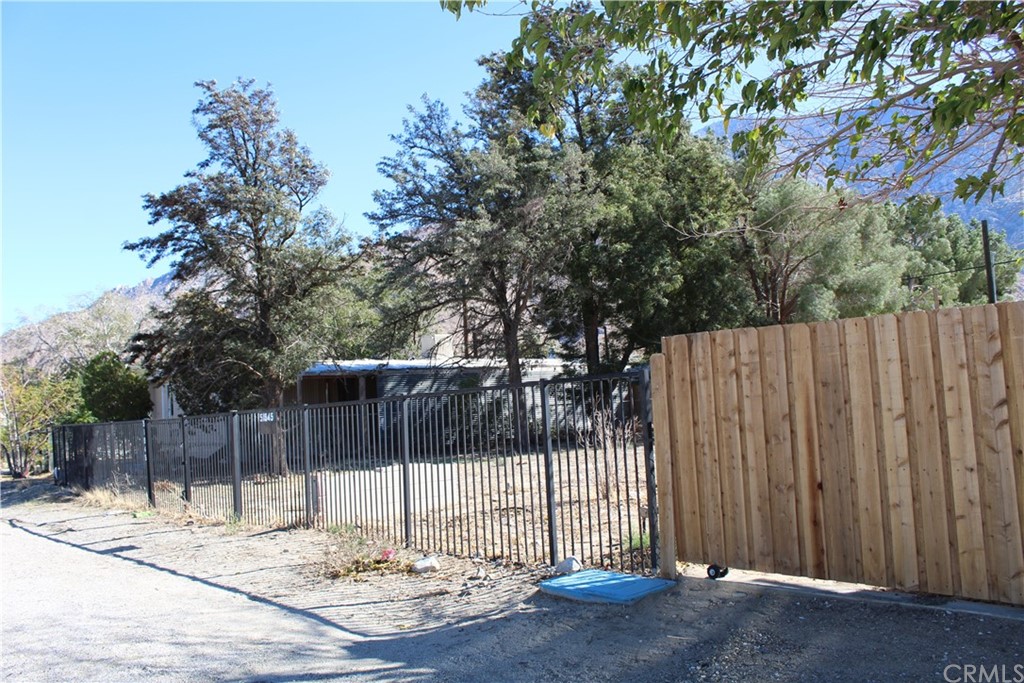 51945 Maxine Avenue Cabazon, CA 92230 - Photo 14 of 21 a view of a dinning table and chairs in the wooden floor