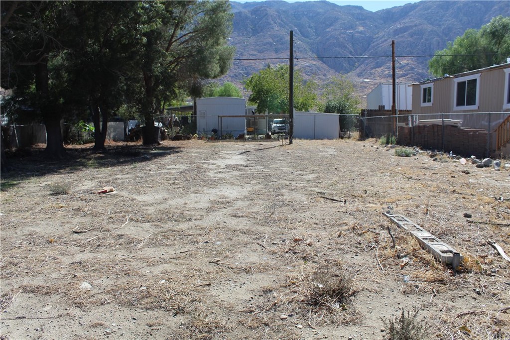 51945 Maxine Avenue Cabazon, CA 92230 - Photo 8 of 21 a view of a backyard with a sitting area