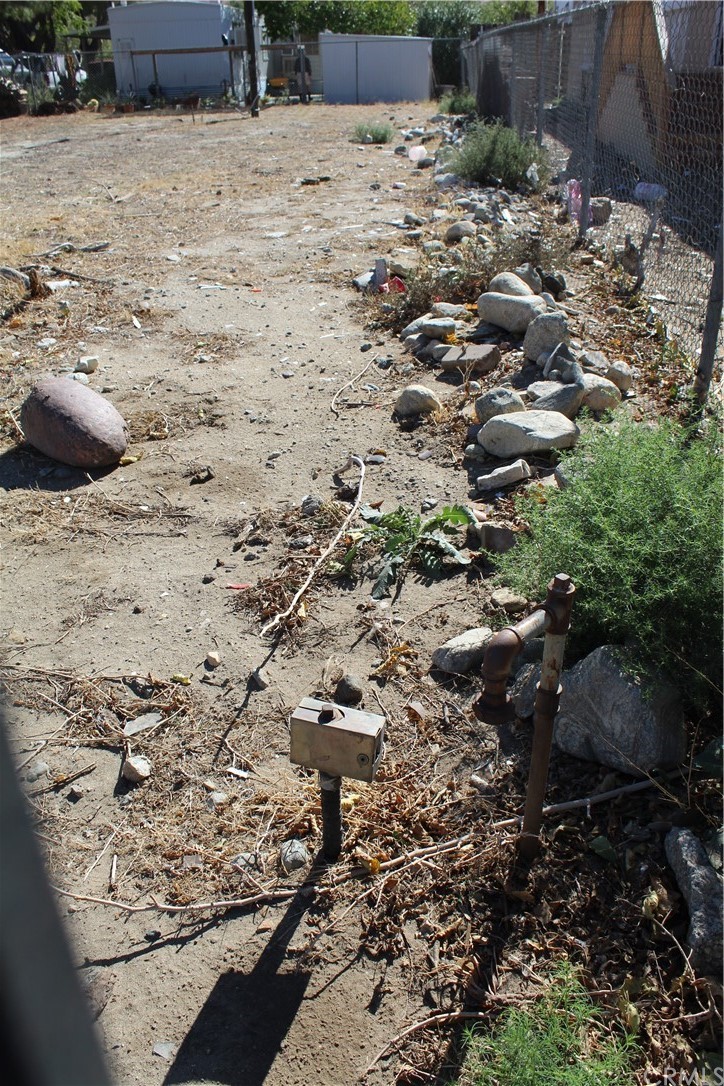 51945 Maxine Avenue Cabazon, CA 92230 - Photo 9 of 21 a view of a dry yard