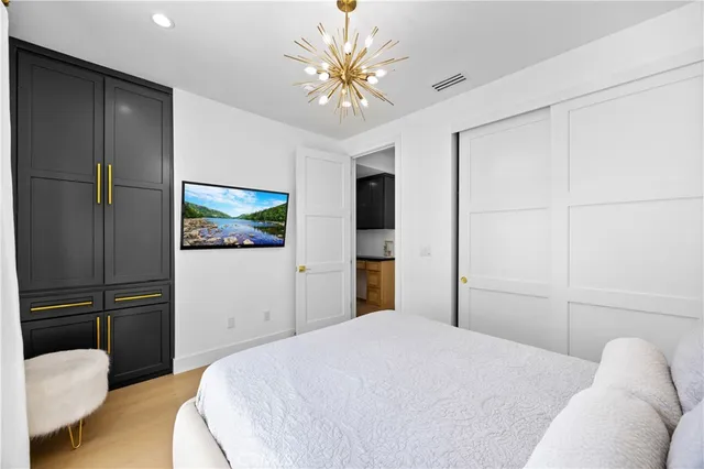 a bathroom with a tub and a sink