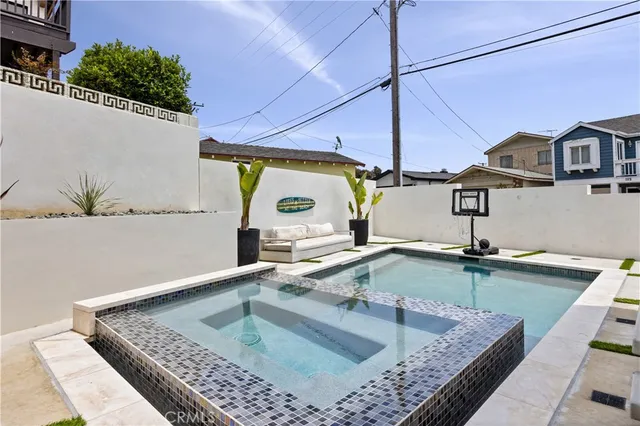 a kitchen with a table and chairs