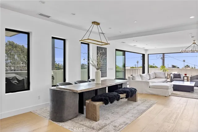 a view of entryway with wooden floor and stairs