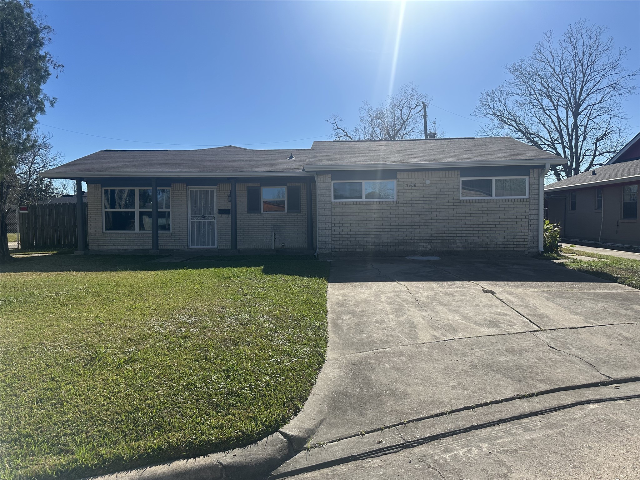 3906 Madden Lane Houston, TX 77047 - Photo 1 of 11 a front view of a house with a yard
