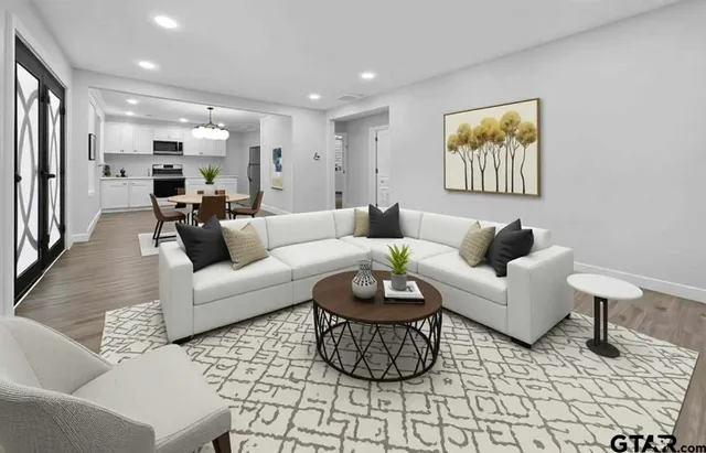 a living room with furniture and a couch