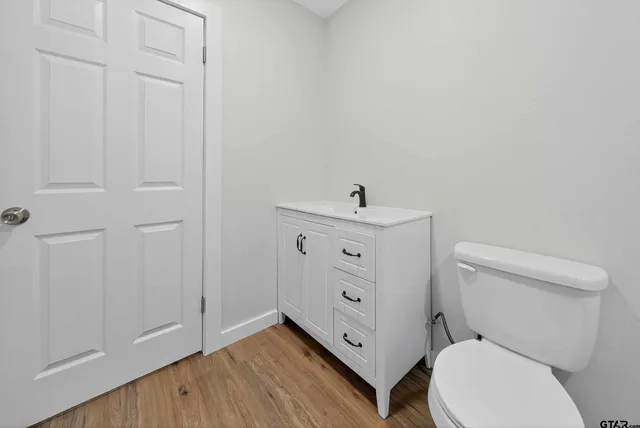 a bathroom with a toilet and a sink