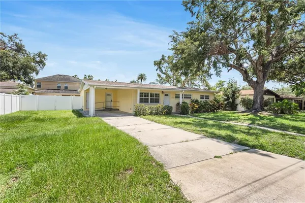 front view of a house with a yard