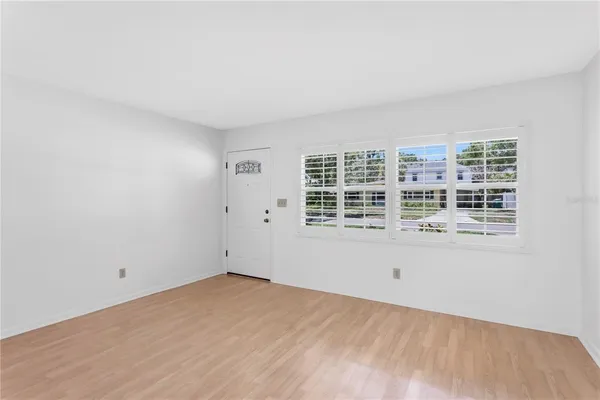 an empty room with windows