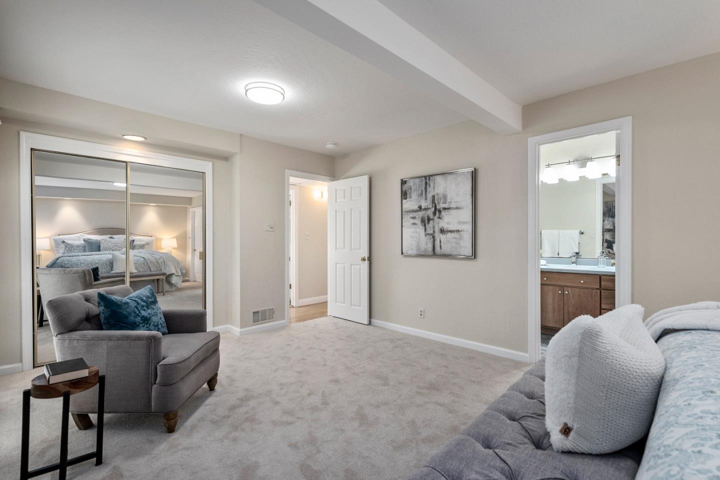 20044 Pacifica Drive Cupertino, CA 95014 - Photo 13 of 23 a living room with furniture and a potted plant