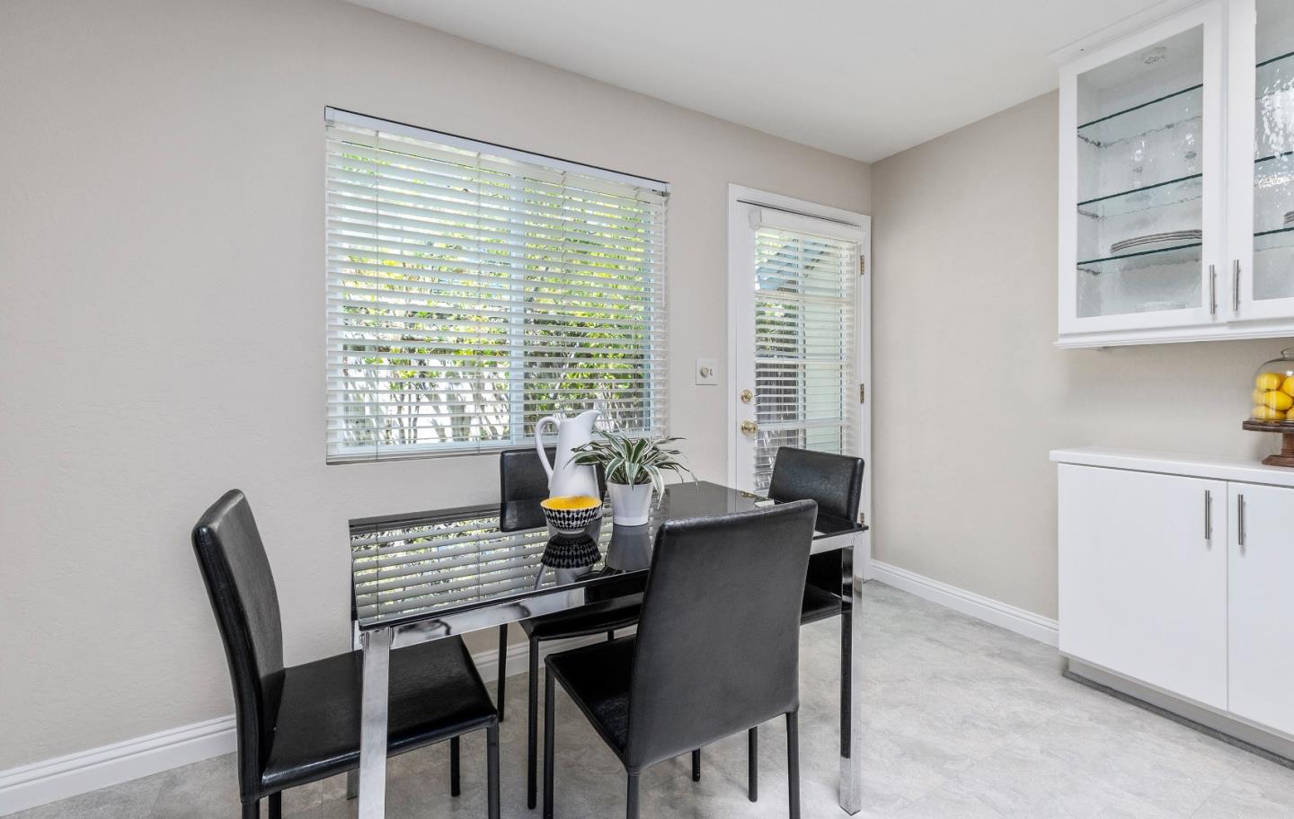 20044 Pacifica Drive Cupertino, CA 95014 - Photo 8 of 23 a view of a dining room with a table and chairs
