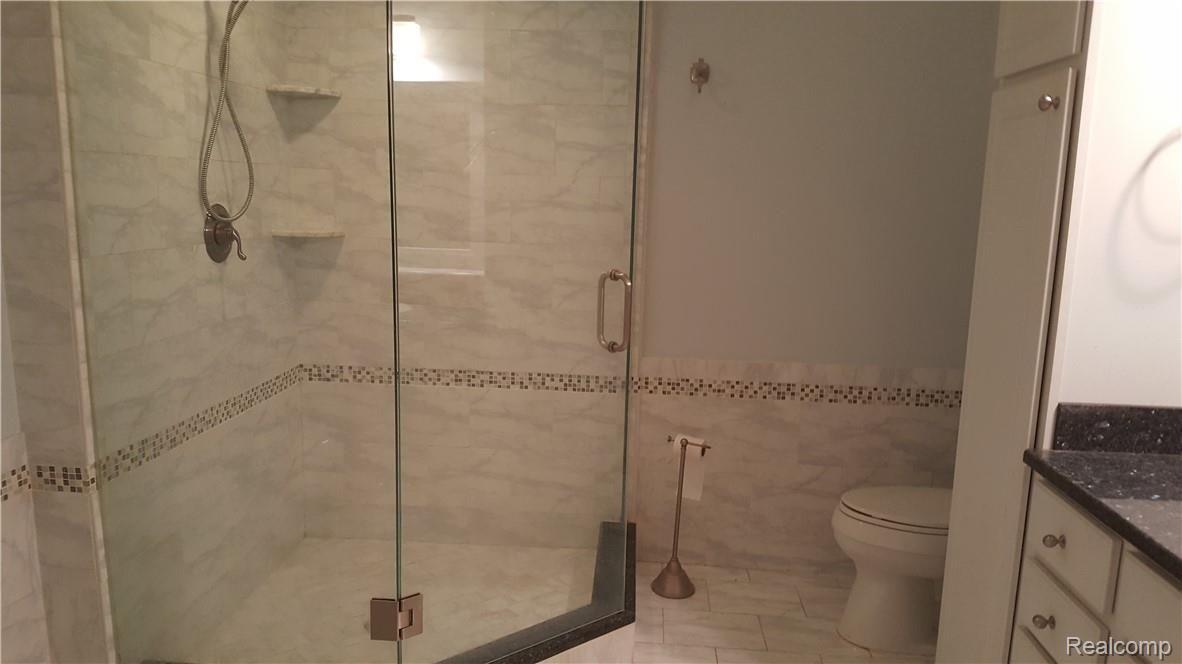 9118 Rucker Road Grosse Ile, MI 48138 - Photo 23 of 47 Separate shower in main 1st floor bathroom.