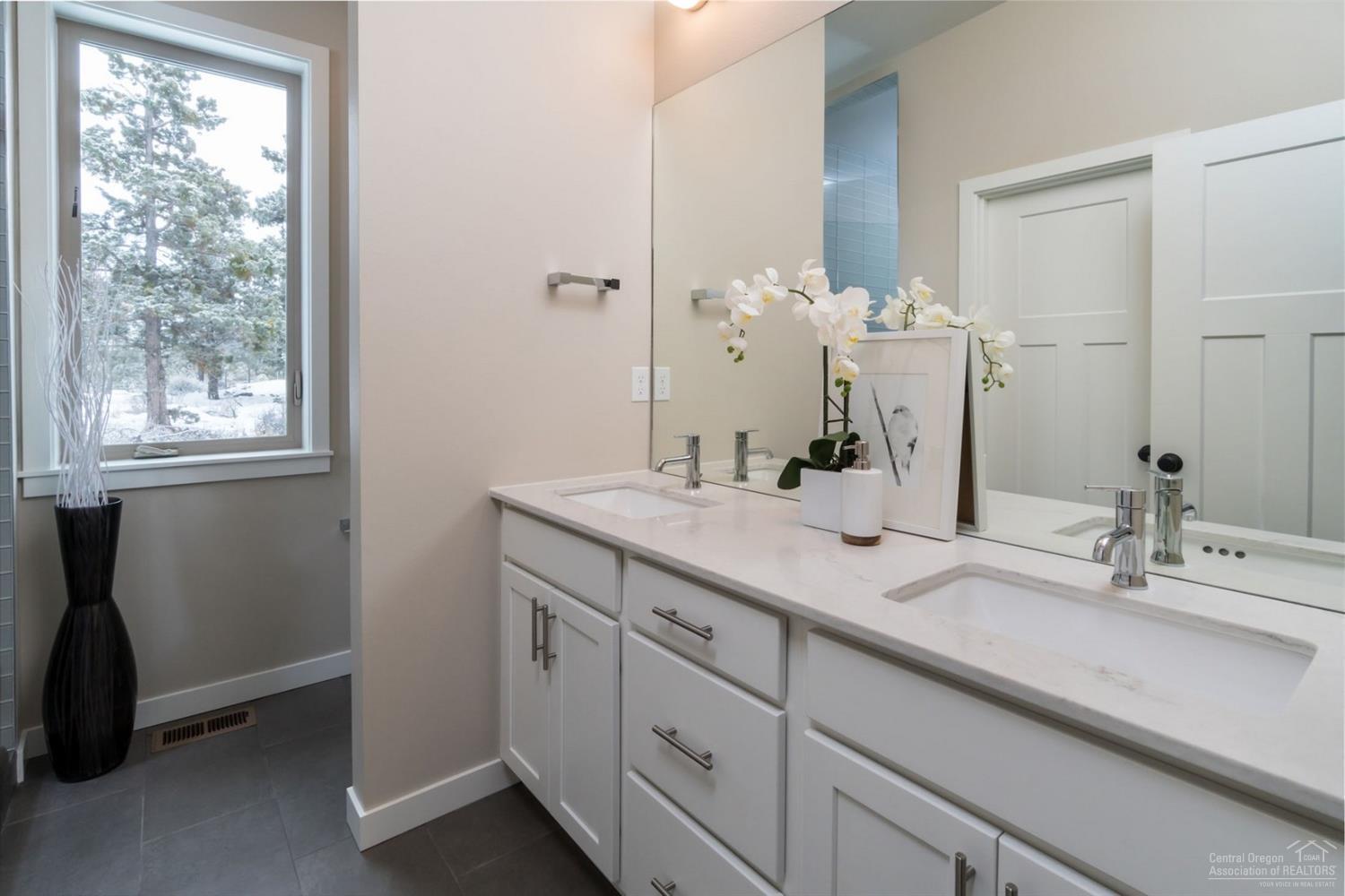 63193 Iner Loop Bend, OR 97701 - Photo 6 of 15 a bathroom with a sink and a mirror