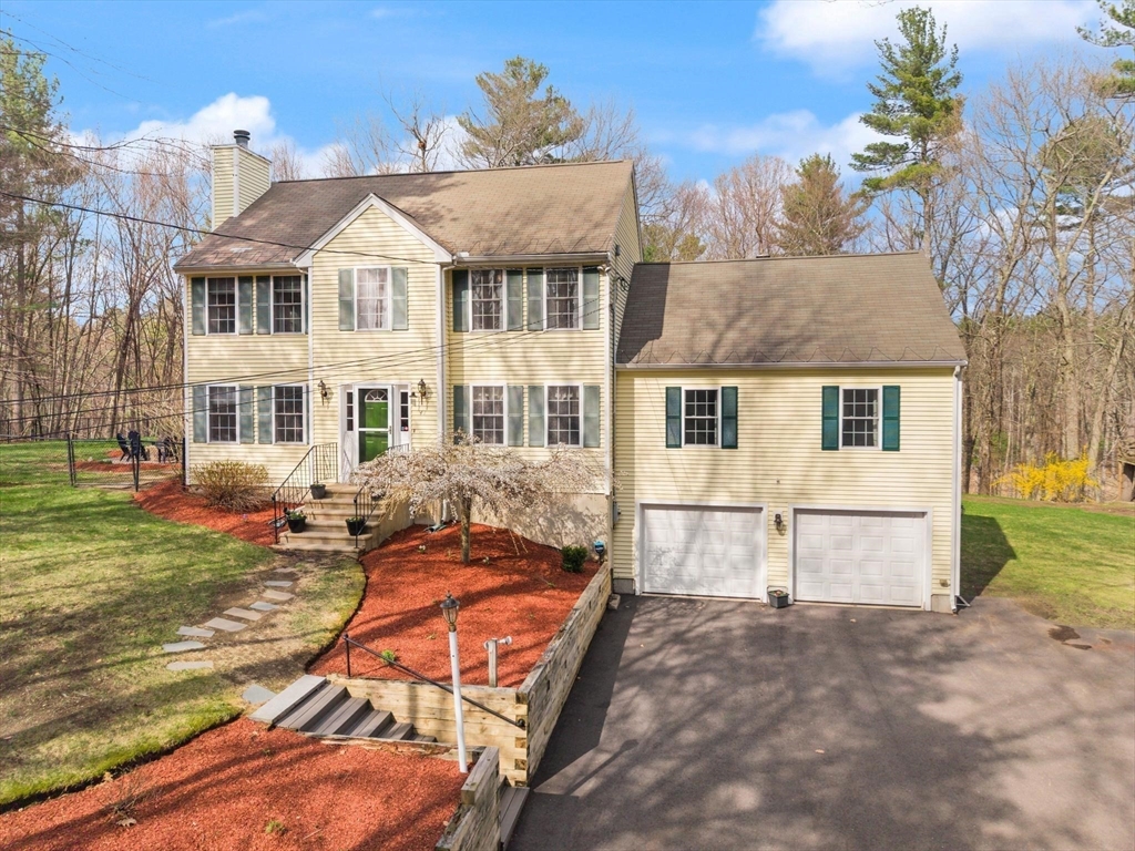 41 Chestnut Road Tyngsborough, MA 01879 - Photo 3 of 32 a view of a house with backyard and sitting area