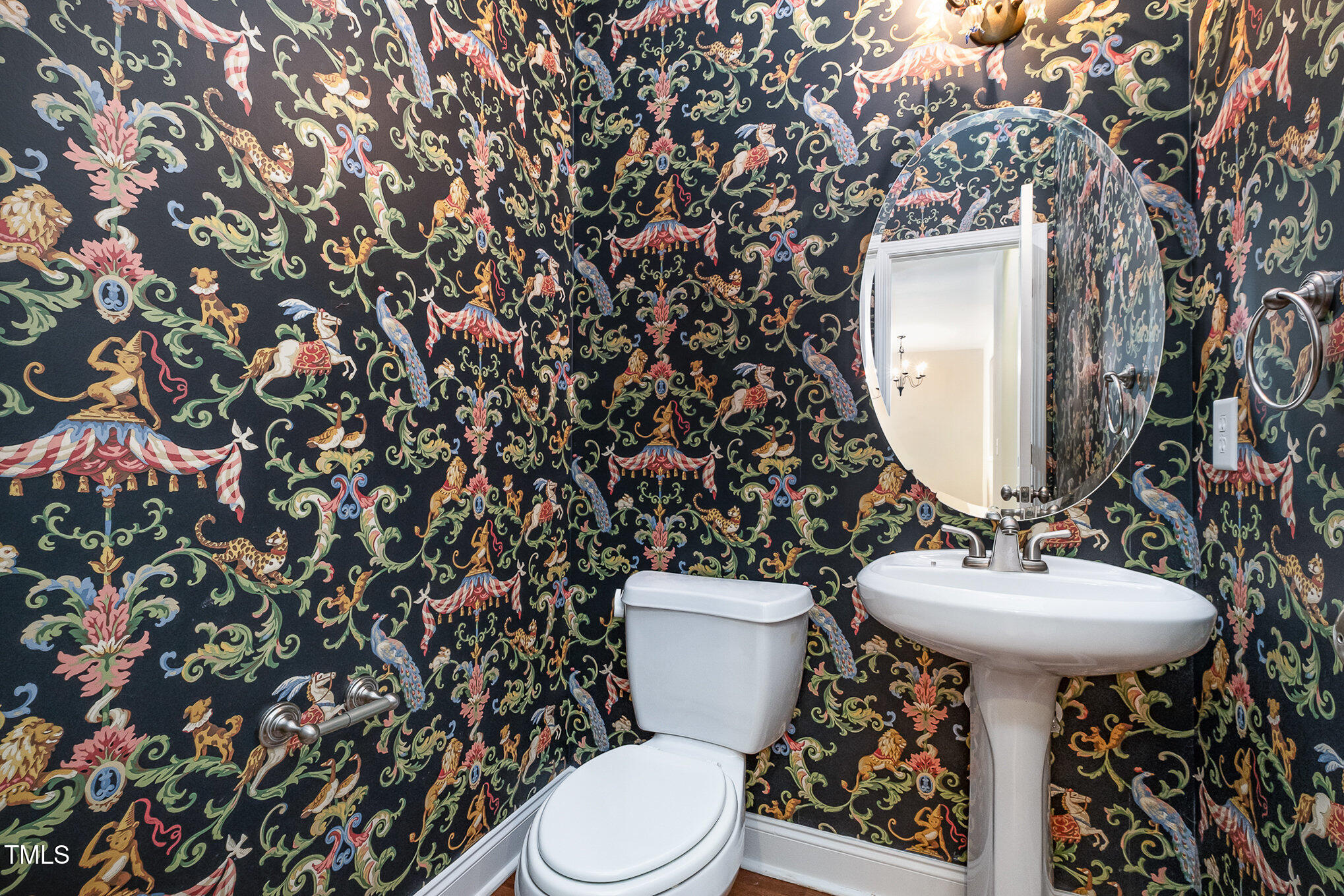 33 Grapevine Trail Durham, NC 27707 - Photo 12 of 30 a bathroom with a toilet sink and mirror