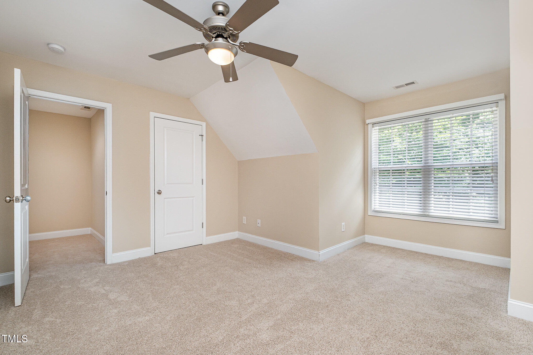 33 Grapevine Trail Durham, NC 27707 - Photo 18 of 30 a view of an empty room with a window