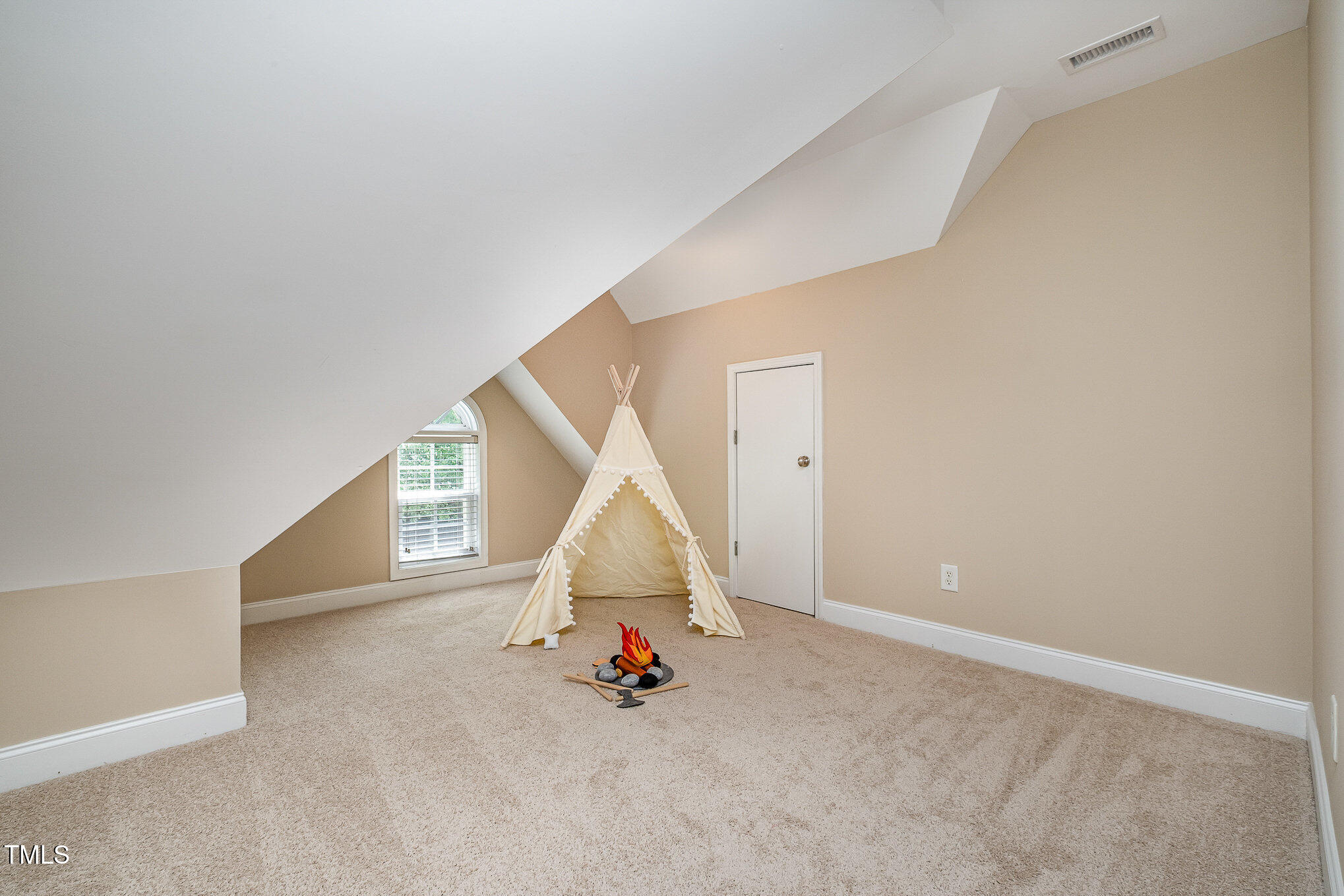 33 Grapevine Trail Durham, NC 27707 - Photo 20 of 30 a view of an empty room with a window