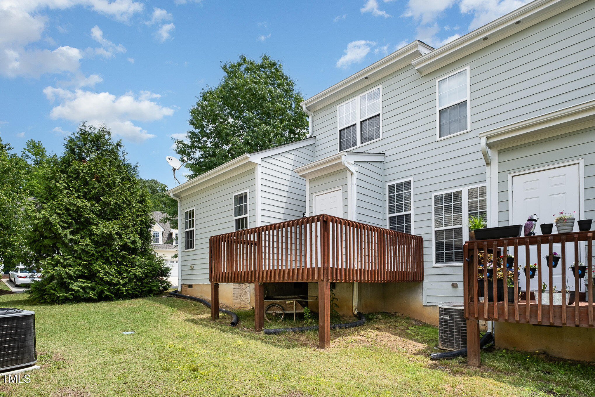 33 Grapevine Trail Durham, NC 27707 - Photo 25 of 30 a view of a house with a yard and sitting area