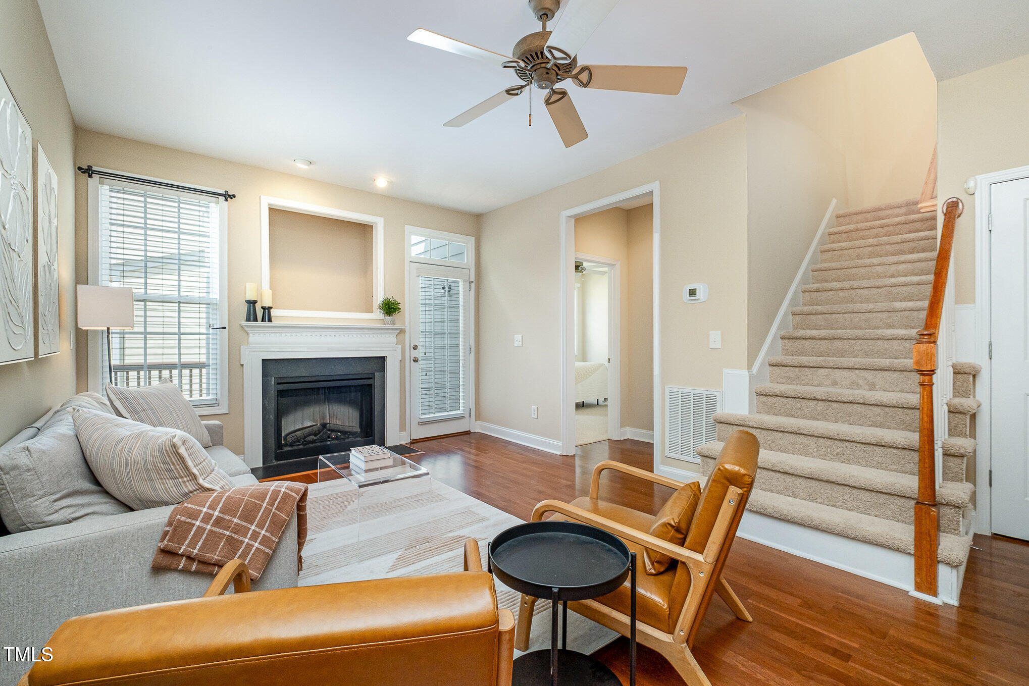 33 Grapevine Trail Durham, NC 27707 - Photo 8 of 30 a living room with furniture and a fireplace