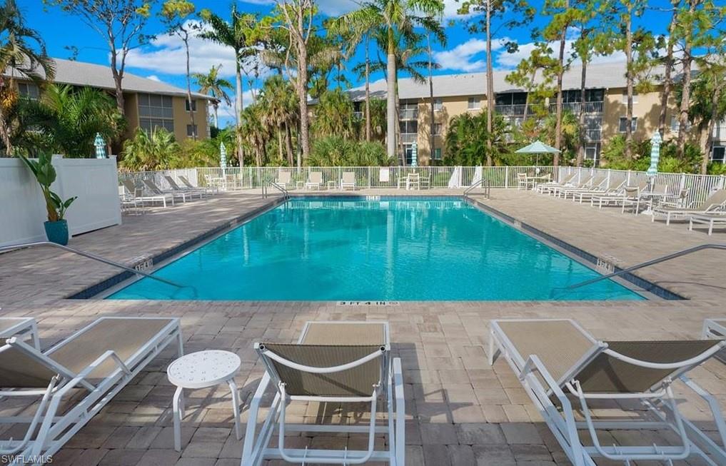 3012 Sandpiper Bay Circle, Unit D102 Naples, FL 34112 - Photo 12 of 13 a view of an outdoor space