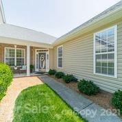 265 Garnet Court, Unit 550 Fort Mill, SC 29708 - Photo 8 of 41 a front view of a house with garden