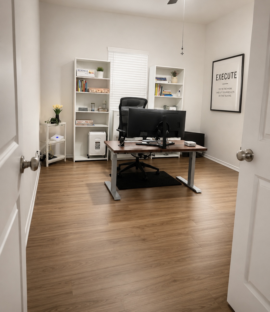 208 Wolf Springs Road Georgetown, TX 78628 - Photo 10 of 32 A quiet office space offers abundant natural light and rich wood flooring.