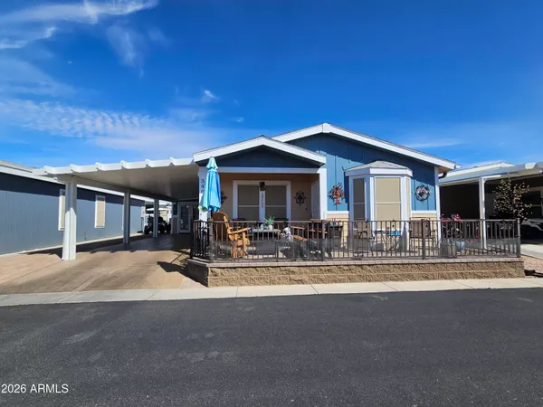 a view of house with outdoor space and porch