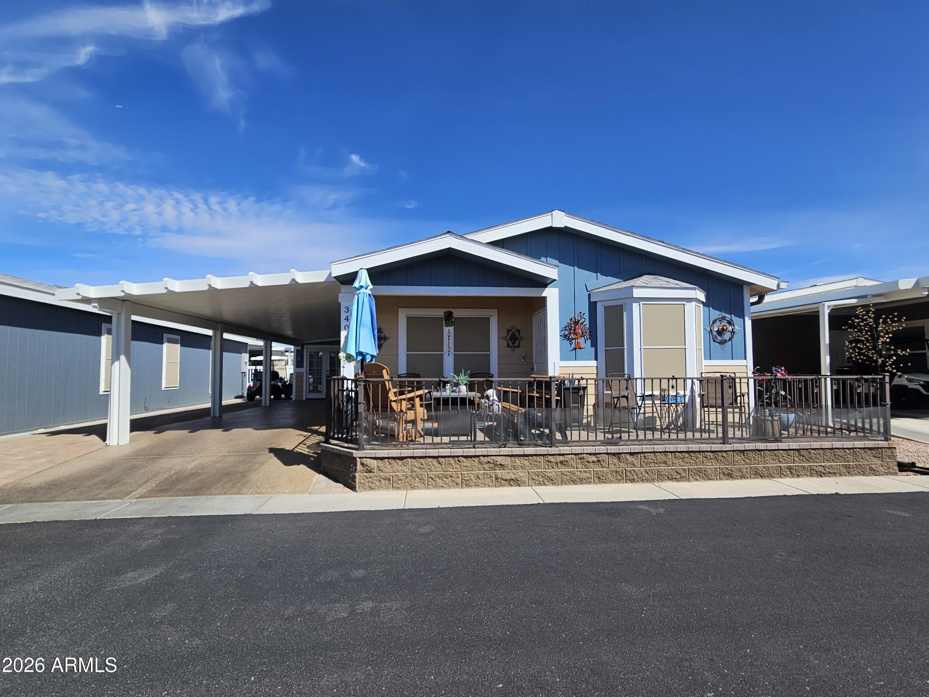 a view of house with outdoor space and porch