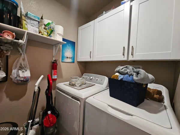 a bathroom with a sink and glass door