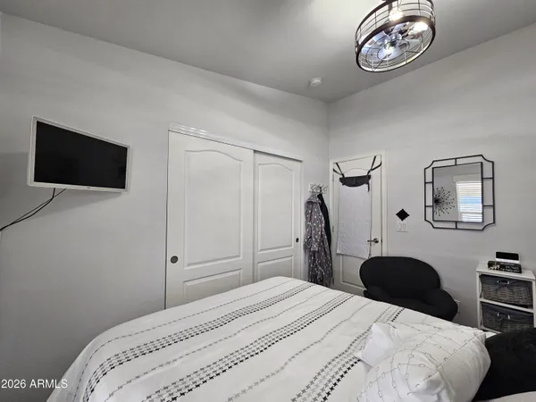a bathroom with a double vanity sink toilet and shower