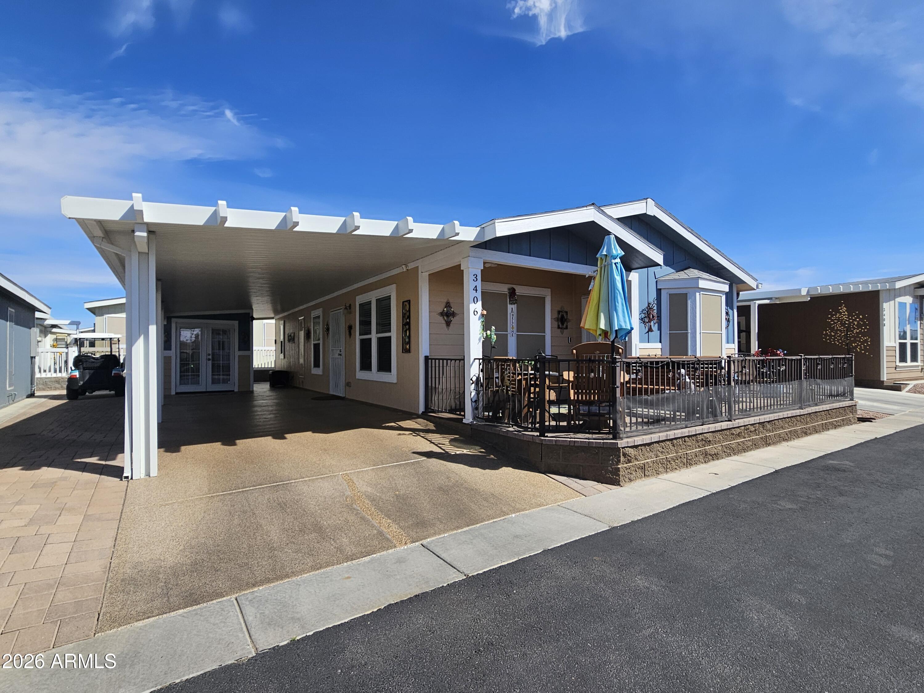 650 North Hawes Road, Unit 3406 Mesa, AZ 85207 - Photo 3 of 45 a view of a house with a patio