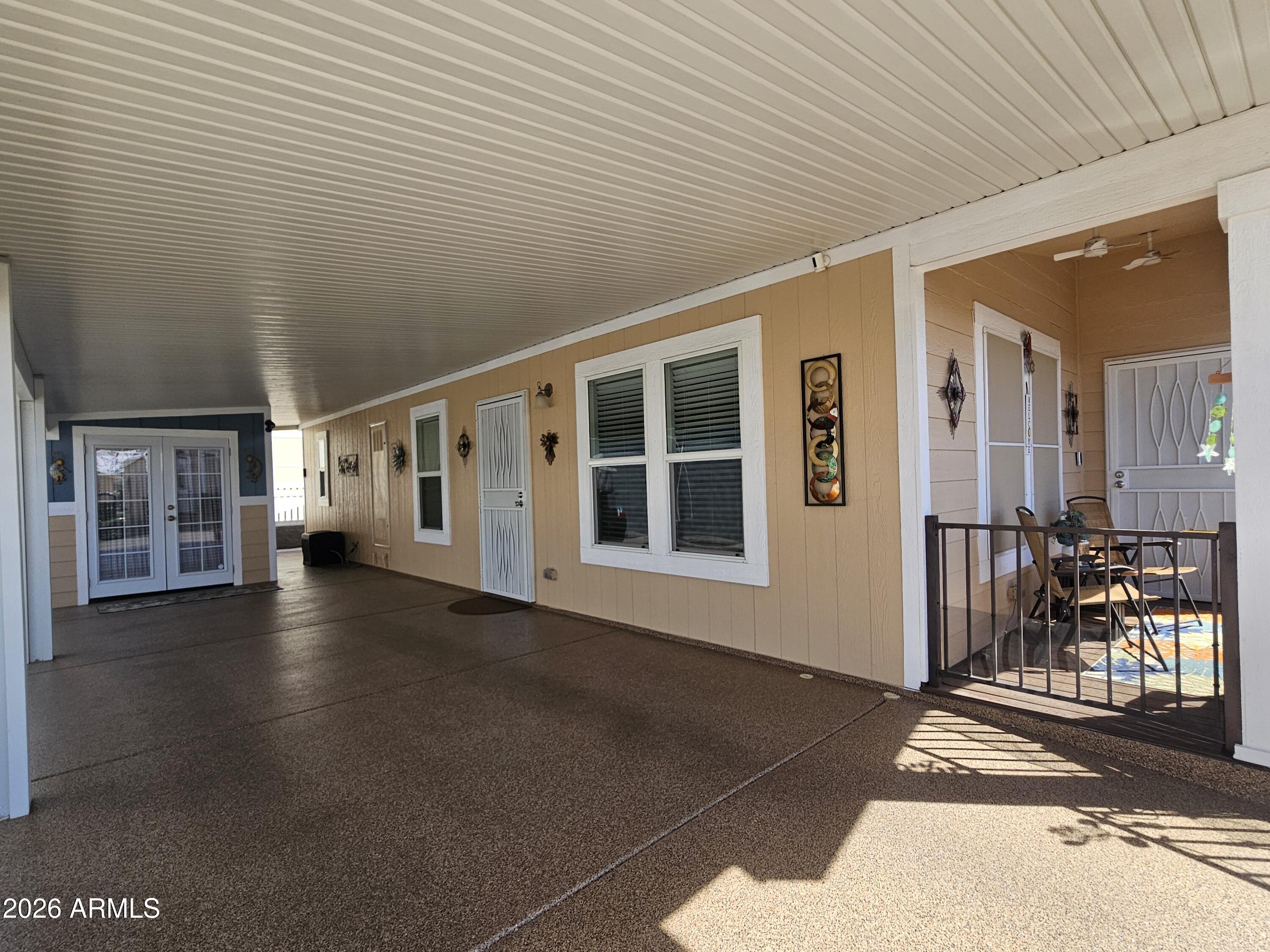 650 North Hawes Road, Unit 3406 Mesa, AZ 85207 - Photo 4 of 45 a view of a building with chairs