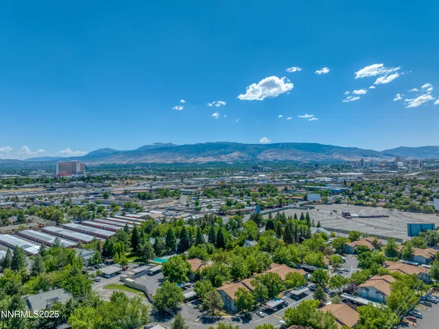 a view of a city with lots of green space