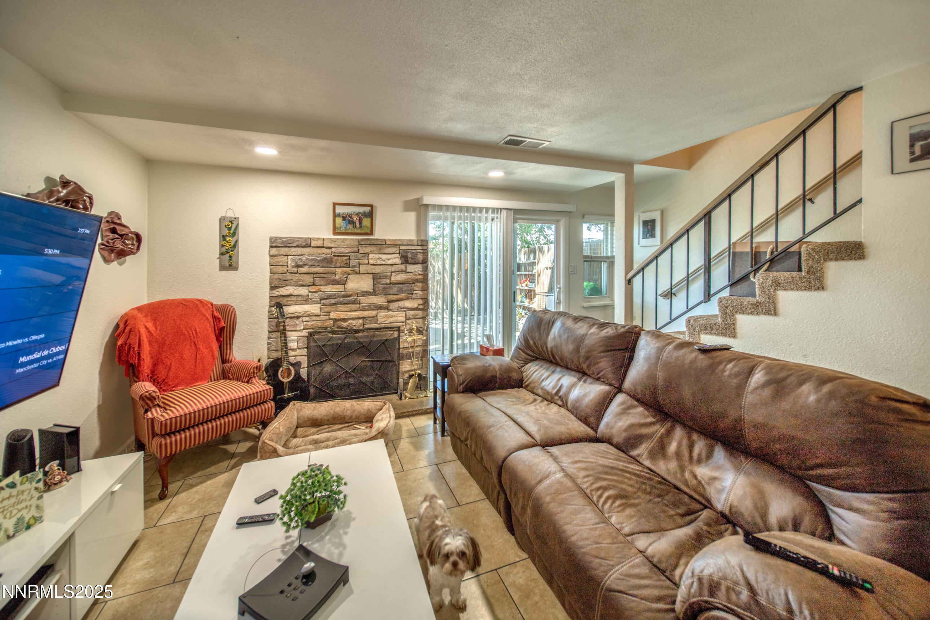 2168 Cannonball Road Sparks, NV 89431 - Photo 2 of 21 a living room with furniture and stairs