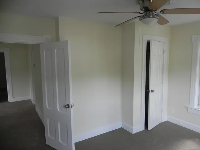 a view of a hallway with a closet