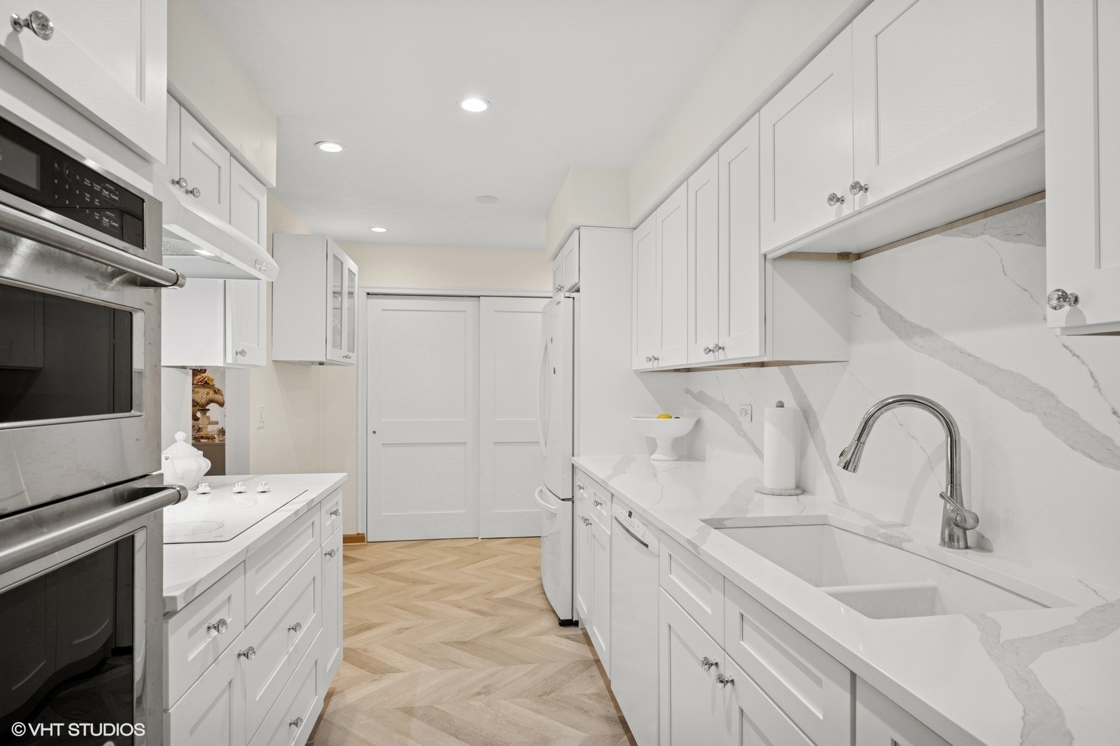 1215 North Waterman Avenue, Unit 3L Arlington Heights, IL 60004 - Photo 2 of 18 a kitchen with sink a microwave and refrigerator