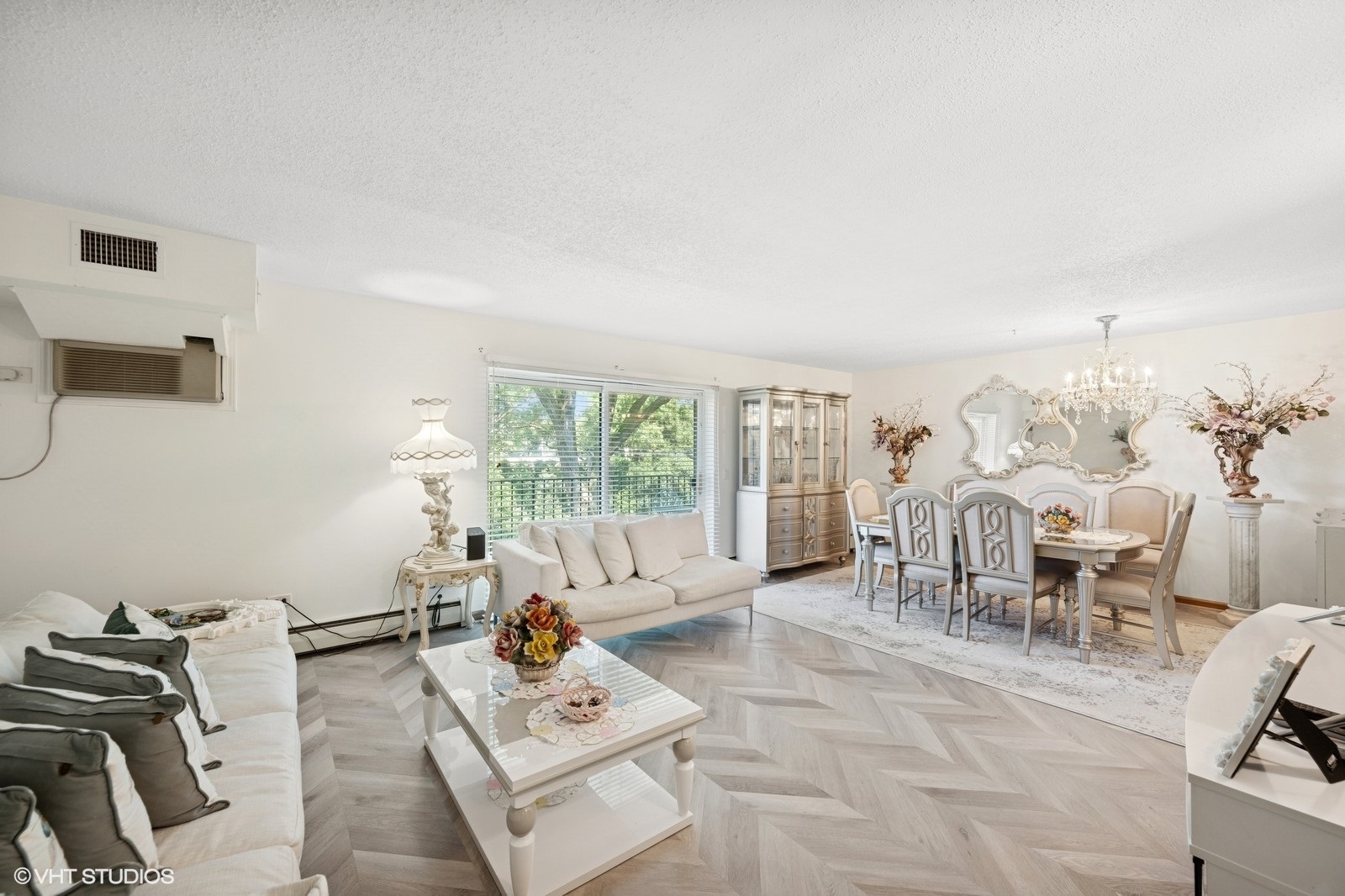 1215 North Waterman Avenue, Unit 3L Arlington Heights, IL 60004 - Photo 8 of 18 a living room with furniture and a floor to ceiling window