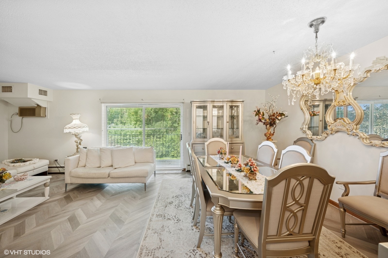 1215 North Waterman Avenue, Unit 3L Arlington Heights, IL 60004 - Photo 9 of 18 a living room with furniture and a chandelier