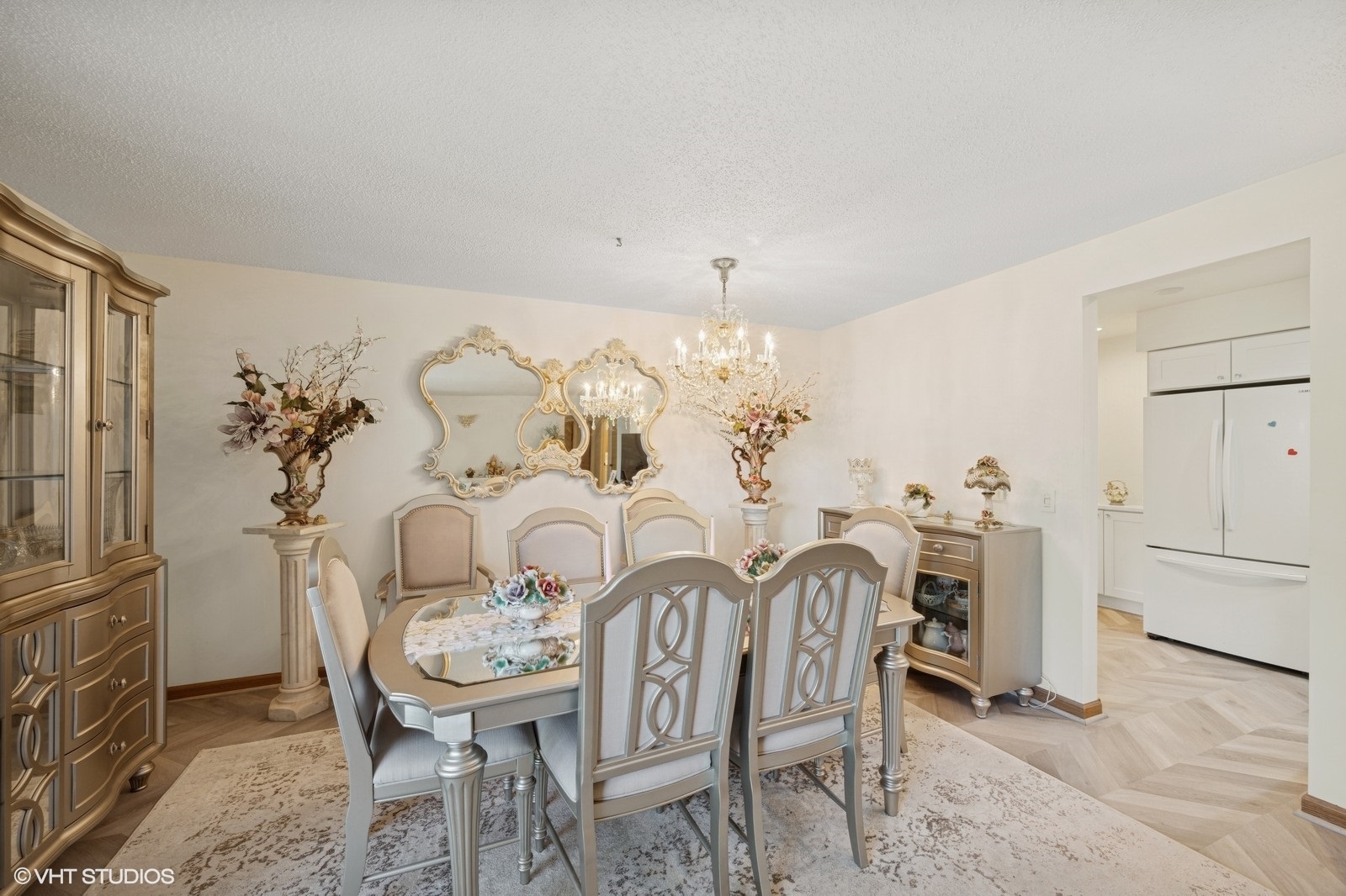 1215 North Waterman Avenue, Unit 3L Arlington Heights, IL 60004 - Photo 10 of 18 a view of a dining room with furniture and chandelier