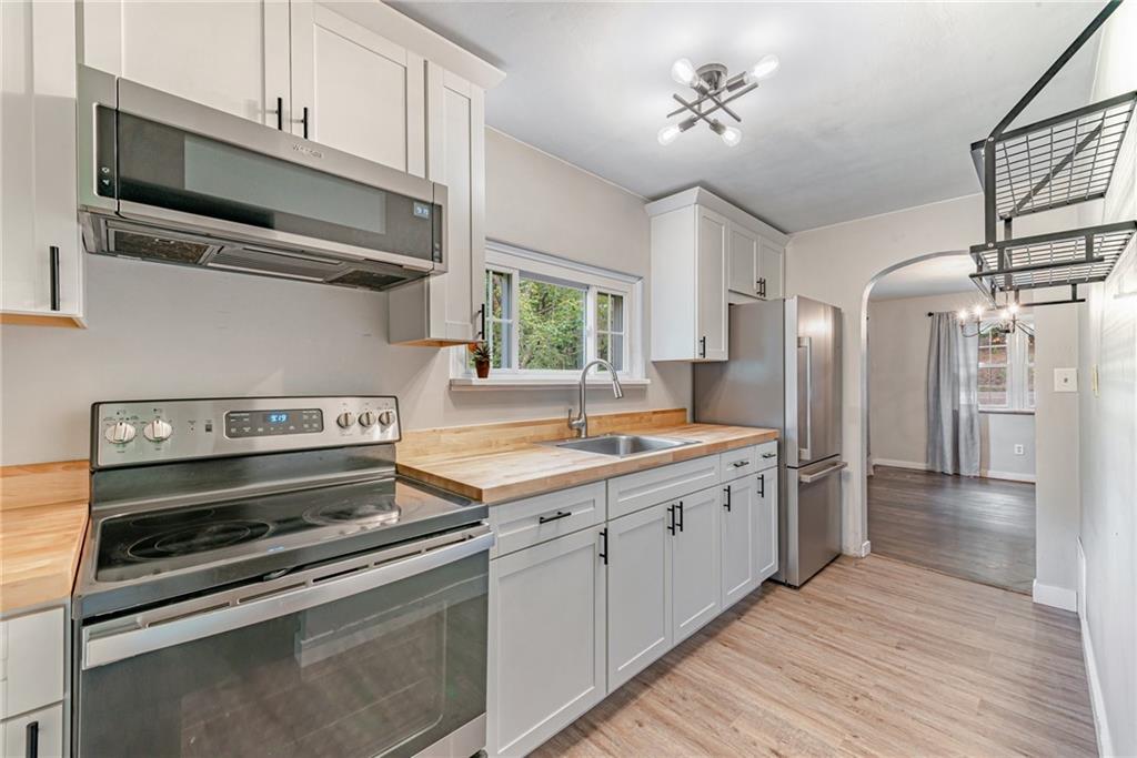 134 Story Road Export, PA 15632 - Photo 12 of 23 a kitchen with a stove oven and sink