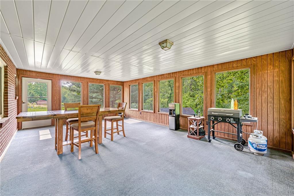 134 Story Road Export, PA 15632 - Photo 13 of 23 a view of a big room with lounge chair and windows